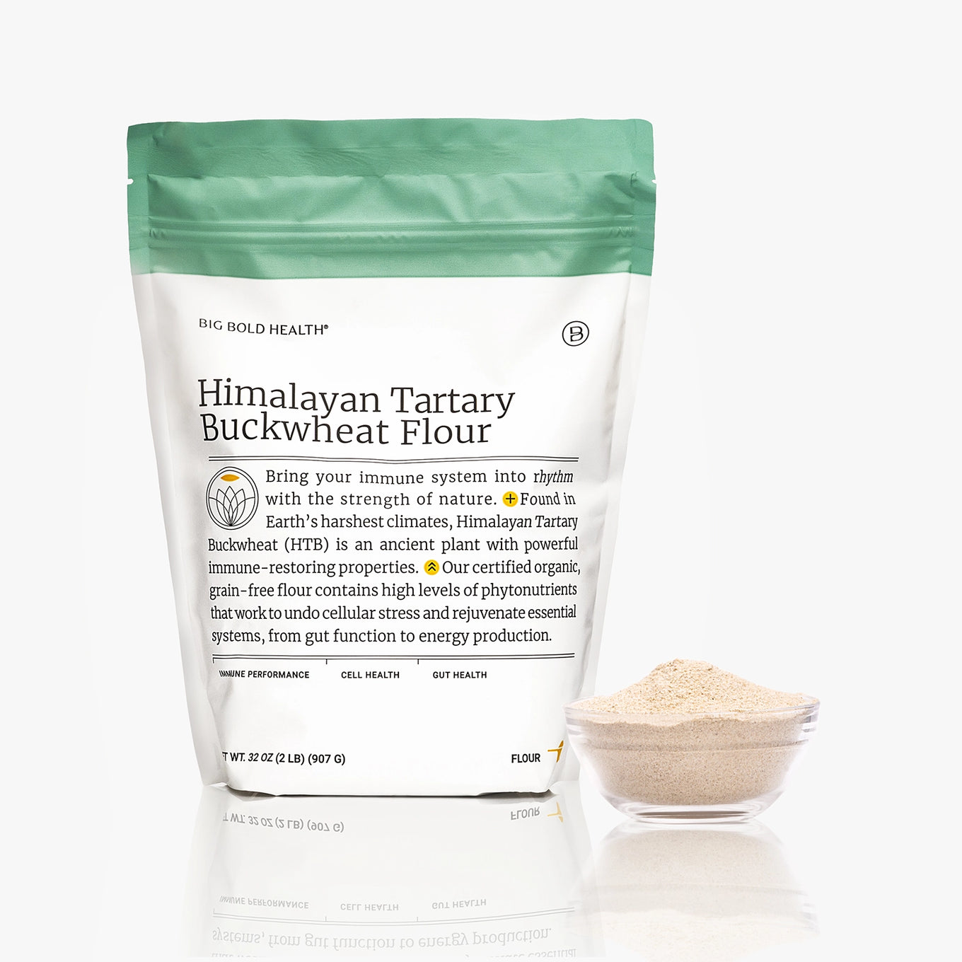 A stand-up pouch of Big Bold Health Himalayan Tartary Buckwheat Flour with a small clear bowl of the flour in front, photographed on a clean white background.