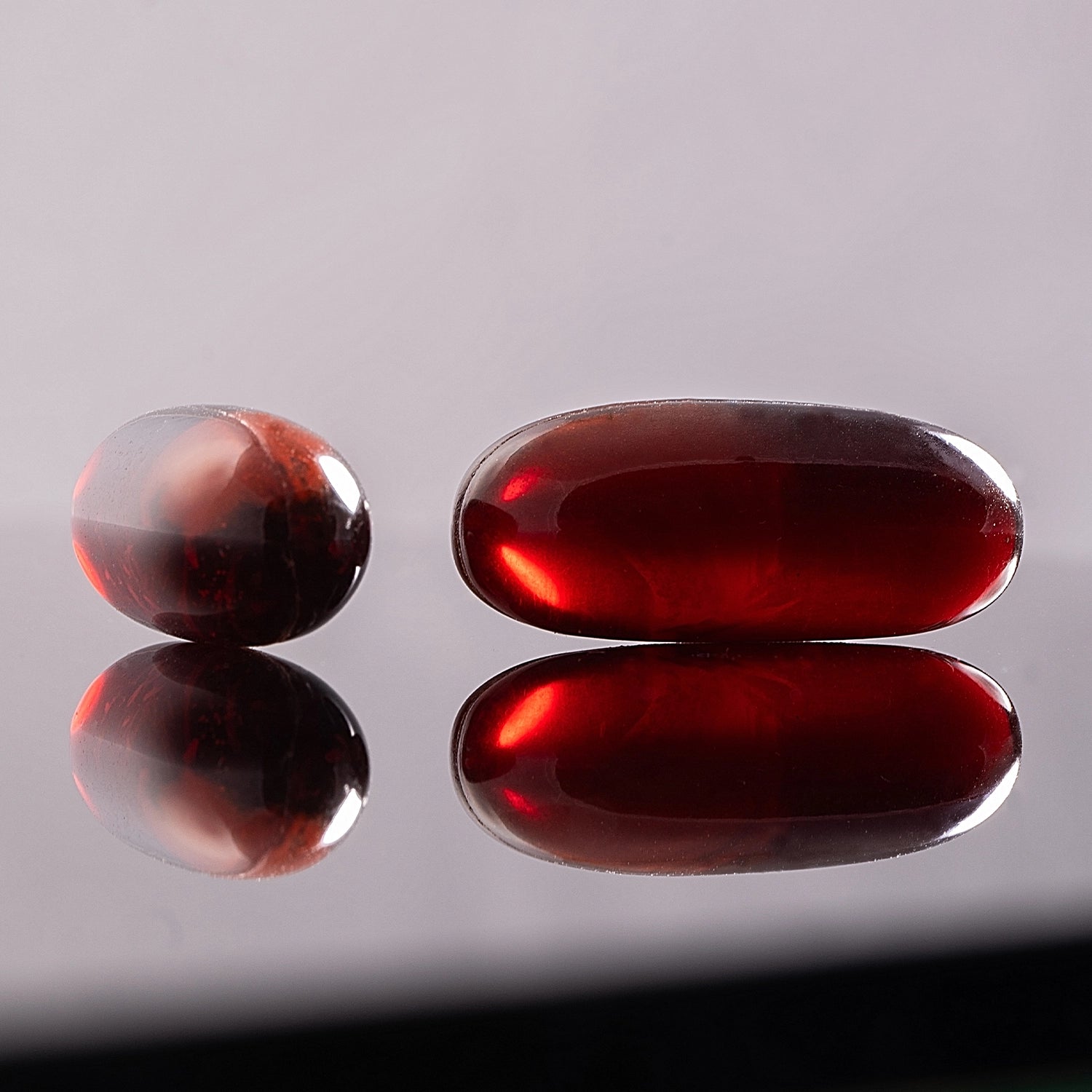 HTB Rejuvenate supplement bottle with capsules and wooden backdrop.