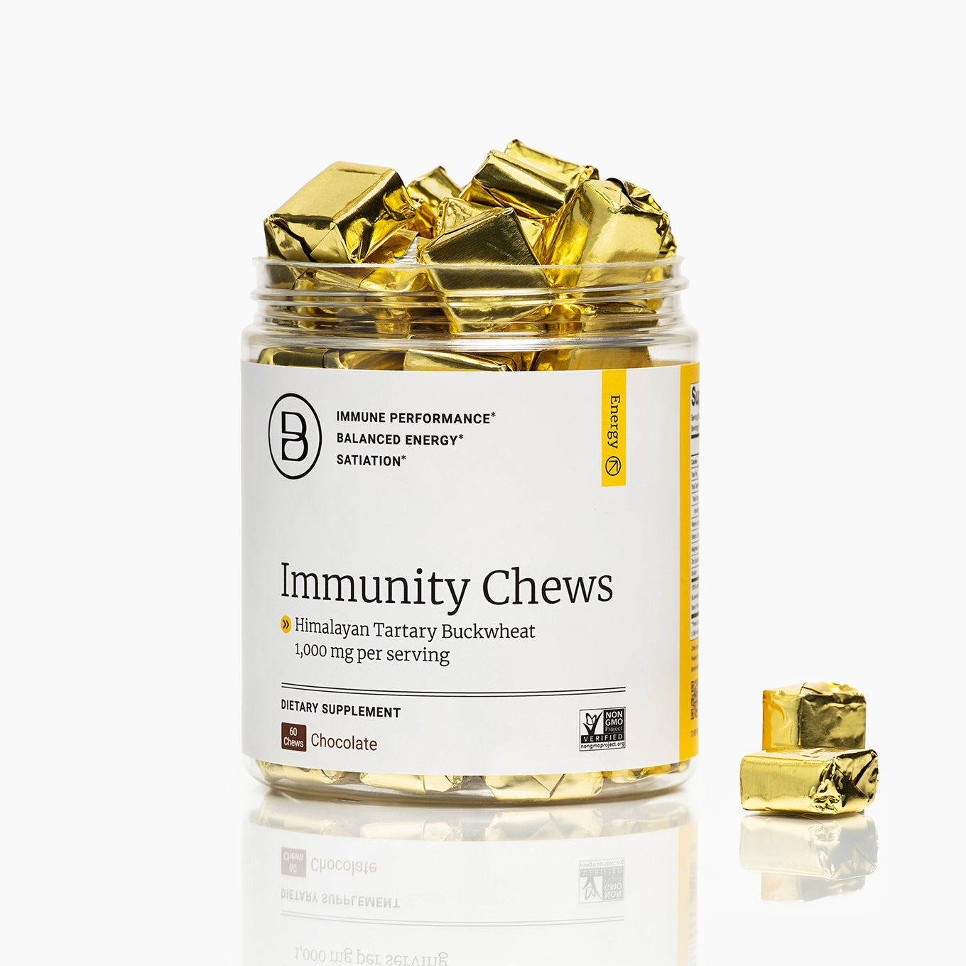 A clear jar of BB Immunity Chews dietary supplement filled with gold foil-wrapped chews, shown on a white background with a few chews placed outside the jar.